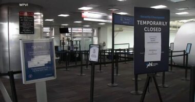 TSA workers face reality of working without pay as passengers unaware of the shutdown see long lines
