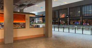 Teen charged after woman, 25, stabbed inside shopping centre on her way to work