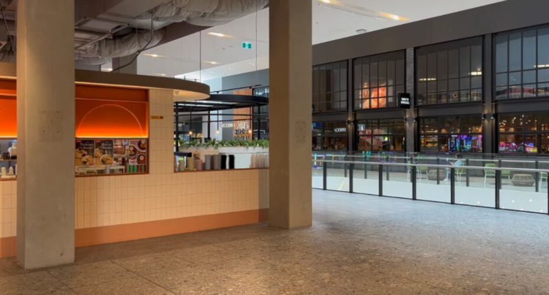 Teen charged after woman, 25, stabbed inside shopping centre on her way to work