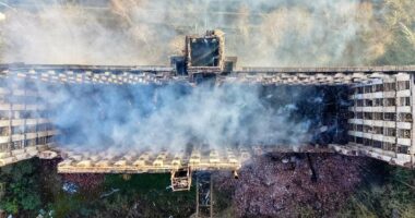 Teenager is arrested after fire rips through Grade II-listed building
