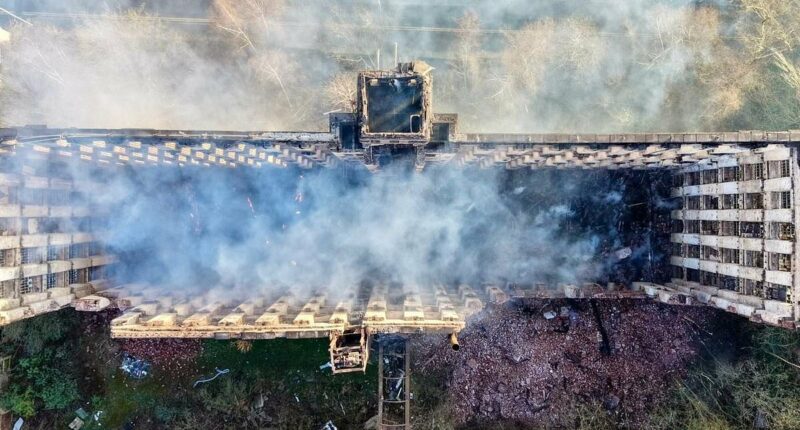 Teenager is arrested after fire rips through Grade II-listed building