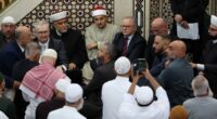 Tense moment Anthony Albanese is heckled at Sydney mosque