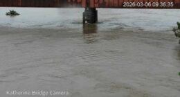 Town facing flood disaster as twin tropical lows dump rain