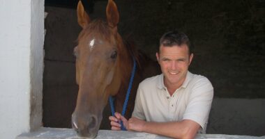 Trainer who 'attacked dogwalker with hockey stick' says he fell over