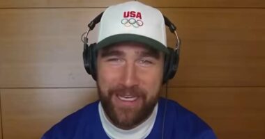 Travis Kelce reveals he dragged Taylor Swift out of bed at 8am to watch Team USA's gold medal hockey win over Canada