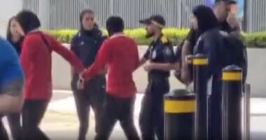 Two faces of tyranny: One had to be dragged onto a bus taking her back to Iran's evil regime. The other is the grinning youngster who wanted to stay - but then did the UNTHINKABLE