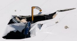 Two killed in helicopter crash after chopper smashes into building