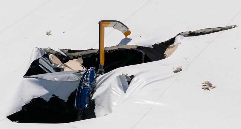 Two killed in helicopter crash after chopper smashes into building