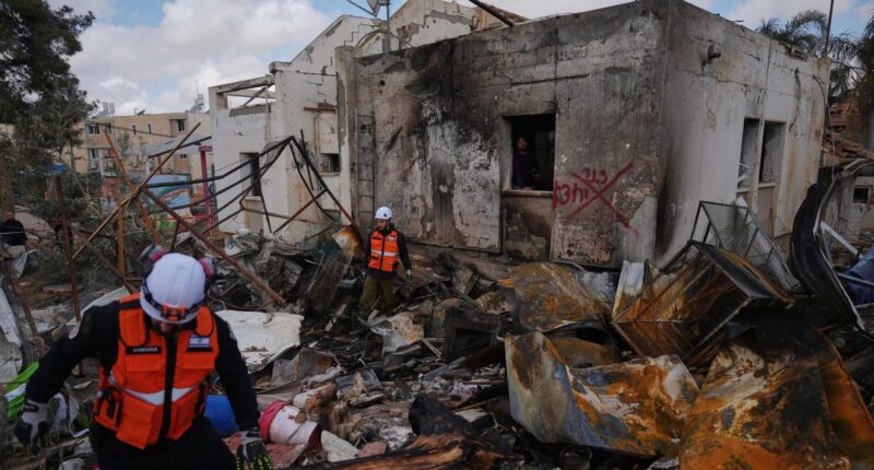 US and Iran trade threats of expanding war after strikes near Israeli areas tied to nuclear sites