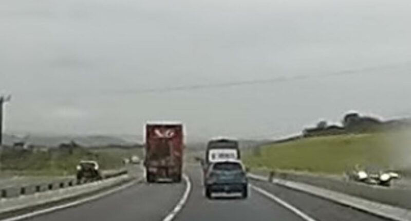 Viewers divided over moment reckless driver undertakes a lorry