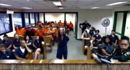 Woman accused of fatal hit-and-run that killed 8 year old laughs during first court appearance