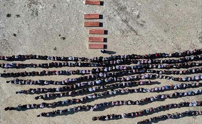 A Syrian man buries his wife and 4 children killed in Israeli strikes on Beirut