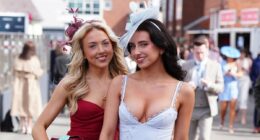 Aintree racegoers don flamboyant hats and mini dresses for Ladies Day
