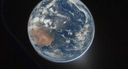This image provided by NASA shows a view of Earth taken by NASA astronaut and Artemis II Commander Reid Wiseman from of the Orion spacecraft's window after completing the translunar injection burn on April 2, 2026.