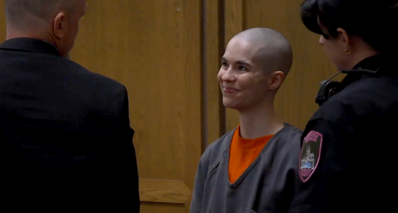 Bald-headed killer smiles as prosecutors reveal what she did before dad walked in