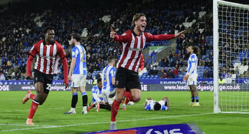 Behind the scenes of Lincoln City's remarkable rise - from paddle boarding and anti-gravity treadmills to the mantra that all staff must buy into