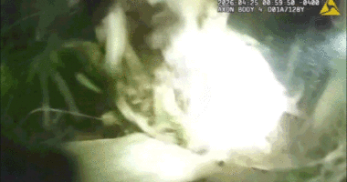 Bodycam shows dad bolt from cops with young child in his arms before ditching her alone in the woods