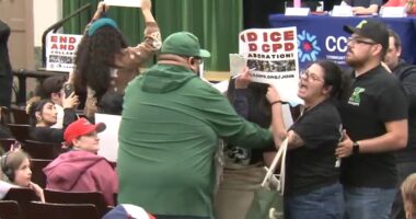 Brighton Park community meeting gets heated over alleged immigration collaboration between Chicago police officers, ICE agents