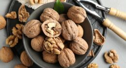 Can walnuts truly be crowned 'the healthiest nut'? How the brain-shaped kernels can lower cholesterol, help to protect against depression AND prevent mindless snacking