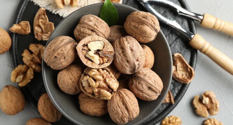Can walnuts truly be crowned 'the healthiest nut'? How the brain-shaped kernels can lower cholesterol, help to protect against depression AND prevent mindless snacking