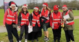 Charity climbdown after axing choir from singing at marathon