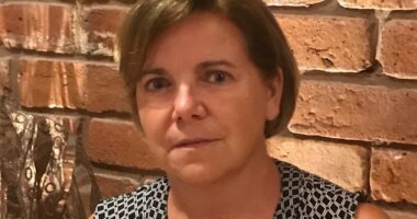 Co-op executive wins £100,000 over equal pay case