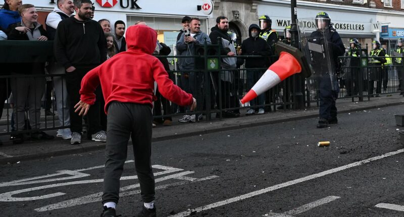 Cone thrown at police and roads blocked in Epsom