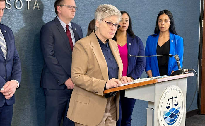 County prosecutor charges ICE agent with assault for pointing gun at people on Minneapolis highway