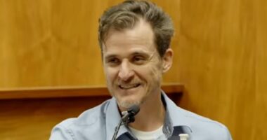 Doctor who tried to push wife off Hawaii cliff LAUGHS at his trial