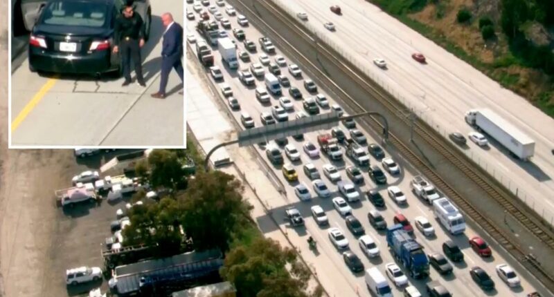 Eastbound 105 Freeway still closed, hours after man found shot inside car