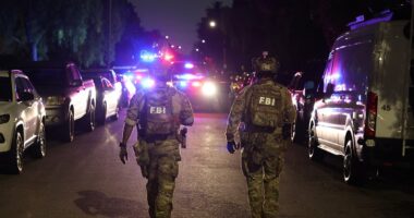 FBI swarm gunman's home as they investigate 'money trail'