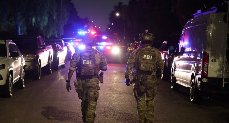 FBI swarm gunman's home as they investigate 'money trail'