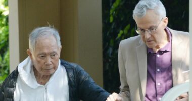 George Takei, 88, leans on husband Brad, 72, in rare joint sighting