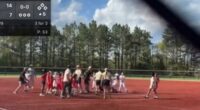 Georgia youth softball coach attacks rival on pitcher's mound in wild catfight caught on video