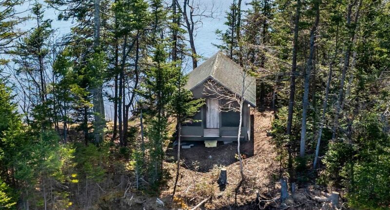 Gorgeous Maine island with rustic cabin and its own private beach lists for very reasonable amount