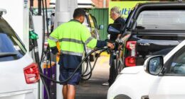 Long queues for petrol at a Sydney service station.