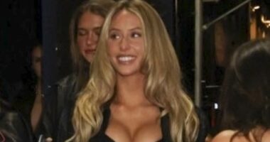 Influencer Alix Earle turns heads in plunging top and miniskirt