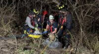 Injured fisherman dramatically rescued from 20 feet below hillside