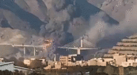 gif of plume of smoke near bridge