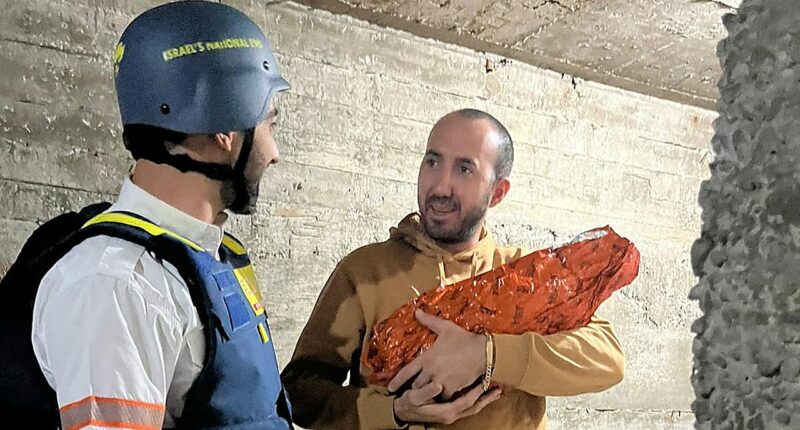 Israeli paramedic delivers baby, rushes it to bomb shelter during Iran attack