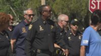 Jacksonville Sheriff T.K. Waters walks in Lakeshore neighborhood to build trust with residents and prevent crime
