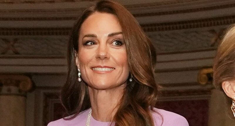 Kate sports late Queen's pearl earrings and necklace