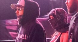 Kim Kardashian and Lewis Hamilton sweetly link arms at Coachella