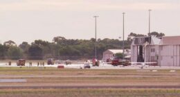 A light plane has crashed into an aircraft hangar in South Australia, just north of Adelaide. Police were called to an area near Kingsï»¿ Road at Parafield after reports the small aircraft had collided with the hangar as the aircraft attempted to land at the airport.
