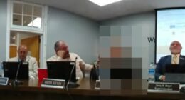 Male school board member puts arm around girl and calls her 'HOT'