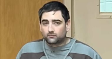 Man who 'invaded family home' smirks as claims take dark twist