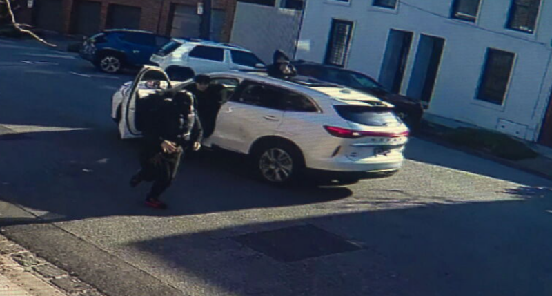 Masked youths carry out broad daylight attack with machetes, sledgehammer