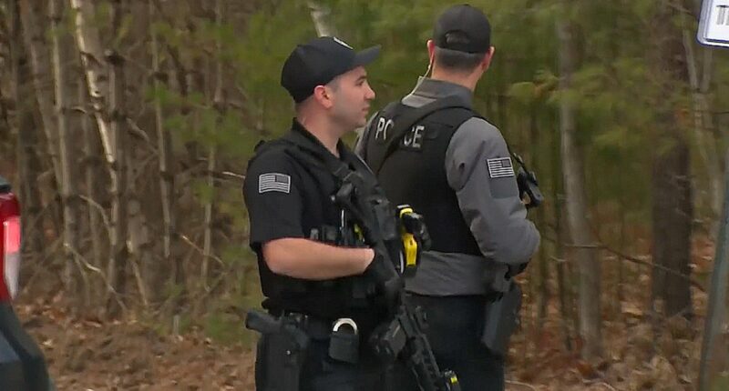 Massive manhunt underway in New Hampshire town after gunman allegedly wounds police officer, fires on family