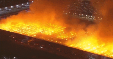 Massive six-alarm blaze engulfs California warehouse, employee detained