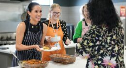 Meghan beams as she serves lunch at a women's homeless shelter after visiting a children's hospital with Harry on the first day of their whirlwind tour of Australia